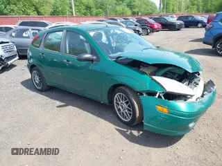 2002 Ford Focus ZX5 z VIN 3FAFP373X2R130965, wystawiony jako IAAI lot #42216638 z przebiegiem 59 236 mil mil oraz . Historia ofert i sprzedaży dostępna na DreamBid. Obrazek 1.