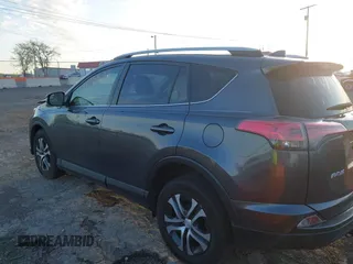 2016 Toyota RAV4 LE with VIN JTMBFREV1GD187414, listed as a IAAI auction lot 42033130 with 123,955 mi miles and . Bid and sale history available at carsss.com. Image 14.