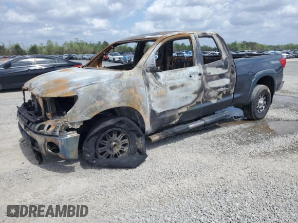 2010 Toyota Tundra с VIN 5TFUM5F15AX005061, выставлен на аукционе Copart как лот 51823565 с пробегом Не указан миль и Списание • Salvage title. История ставок и продаж доступна на DreamBid. Изображение 1.