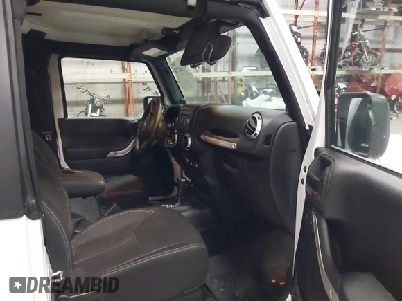 2014 Jeep Wrangler Sahara with VIN 1C4AJWBG7EL234625, listed as a IAAI auction lot 41726770 with 128,080 mi miles and . Bid and sale history available at DreamBid. Image 5.