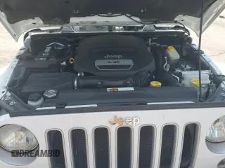2016 Jeep Wrangler Unlimited Sahara with VIN 1C4BJWEG6GL182794, listed as a Copart auction lot 57880725 with 127,752 mi miles and Salvage title. Bid and sale history available at DreamBid. Image 11.