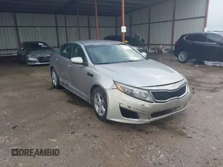 2015 Kia Optima LX z VIN 5XXGM4A72FG361601, wystawiony jako IAAI lot #41462391 z przebiegiem 173 464 mil mil oraz . Historia ofert i sprzedaży dostępna na DreamBid. Obrazek 1.