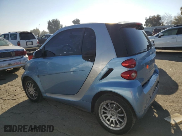 2011 Smart fortwo Pure z VIN WMEEJ3BA1BK431045, wystawiony jako Copart lot #87462044 z przebiegiem 22 128 mil mil oraz Szkoda całkowita • Salvage title. Historia ofert i sprzedaży dostępna na DreamBid. Obrazek 2.