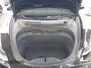 2023 Tesla Model 3 with VIN 5YJ3E1EA7PF473749, listed as a IAAI auction lot 41921478 with 21,483 mi miles and . Bid and sale history available at DreamBid. Image 10.