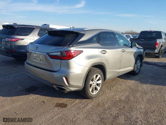 2017 Lexus RX with VIN 2T2BZMCA8HC094605, listed as a IAAI auction lot 41229579 with 125607 miles. Bid and sale history available at carsss.com. Image 4.