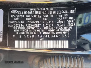 2014 Kia Sorento LX z VIN 5XYKT4A74EG461352, wystawiony jako Copart lot #53847275 z przebiegiem 100 700 mil mil oraz Szkoda całkowita • Salvage title. Historia ofert i sprzedaży dostępna na DreamBid. Obrazek 13.