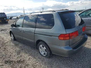 2001 Honda Odyssey EX z VIN 2HKRL18691H571178, wystawiony jako Copart lot #57343205 z przebiegiem 198 506 mil mil oraz Czysty tytuł • Clean title. Historia ofert i sprzedaży dostępna na DreamBid. Obrazek 2.