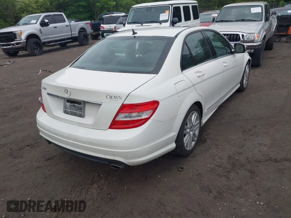 2009 Mercedes-Benz C-Class 3.0L Sport with VIN WDDGF54X59R054278, listed as a IAAI auction lot 42090960 with 107,179 mi miles. Bid and sale history available at carsss.com. Image 4.