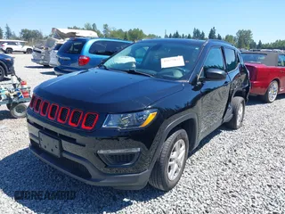 2018 Jeep Compass Sport with VIN 3C4NJDAB1JT261863, listed as a IAAI auction lot 42677037 with 93,263 mi miles and . Bid and sale history available at DreamBid. Image 2.
