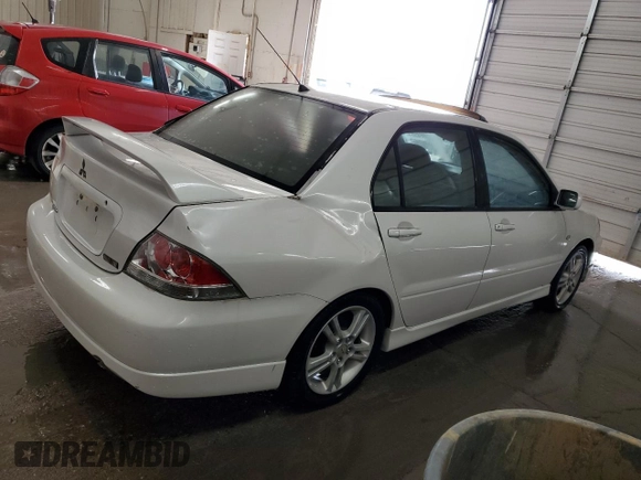 2004 Mitsubishi Lancer with VIN JA3AJ66F64U029144, listed as a Copart auction lot 77437234 with 158,049 mi miles and Salvage Title. Bid and sale history available at DreamBid. Image 3.