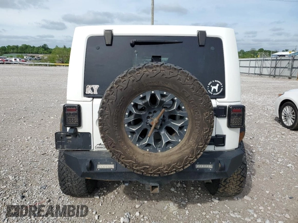 2014 Jeep Wrangler Unlimited Sahara z VIN 1C4BJWEG9EL102336, wystawiony jako Copart lot #55391335 z przebiegiem Nie podano mil oraz Szkoda całkowita • Salvage title. Historia ofert i sprzedaży dostępna na DreamBid. Obrazek 6.