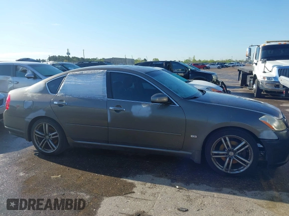 2007 Infiniti M Sport z VIN JNKAY01E97M312438, wystawiony jako IAAI lot #41868192 z przebiegiem 244 874 mil mil oraz . Historia ofert i sprzedaży dostępna na DreamBid. Obrazek 13.