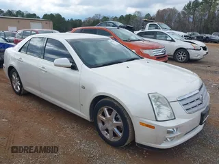 2007 Cadillac STS z VIN 1G6DW677070195889, wystawiony jako IAAI lot #41859364 z przebiegiem 94 731 mil mil oraz . Historia ofert i sprzedaży dostępna na DreamBid. Obrazek 1.