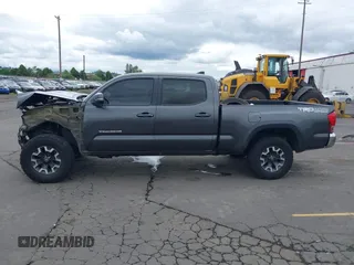 2017 Toyota Tacoma SR5 with VIN 3TMDZ5BN3HM027098, listed as a IAAI auction lot 42409977 with 97,224 mi miles and . Bid and sale history available at DreamBid. Image 15.