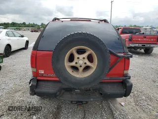 1999 Chevrolet Blazer LS с VIN 1GNCT18W3XK150385, выставлен на аукционе Copart как лот 58490985 с пробегом 262 007 миль миль и Списание • Salvage title. История ставок и продаж доступна на DreamBid. Изображение 6.