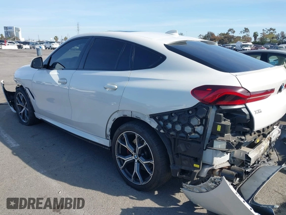 2022 BMW X6 M50i z VIN 5UXCY8C01N9J14882, wystawiony jako IAAI lot #41856966 z przebiegiem 22 893 mil mil oraz . Historia ofert i sprzedaży dostępna na DreamBid. Obrazek 15.
