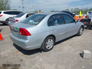 2002 Honda Civic LX with VIN 1HGES16672L068736, listed as a IAAI auction lot 41974936 with 92,211 mi miles. Bid and sale history available at carsss.com. Image 4.