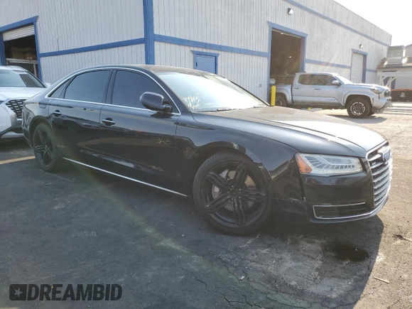 2015 Audi A8 3.0T с VIN WAU3GAFD2FN011129, выставлен на аукционе Copart как лот 64904045 с пробегом 147 549 миль миль и Чистый • Clean title. История ставок и продаж доступна на DreamBid. Изображение 4.