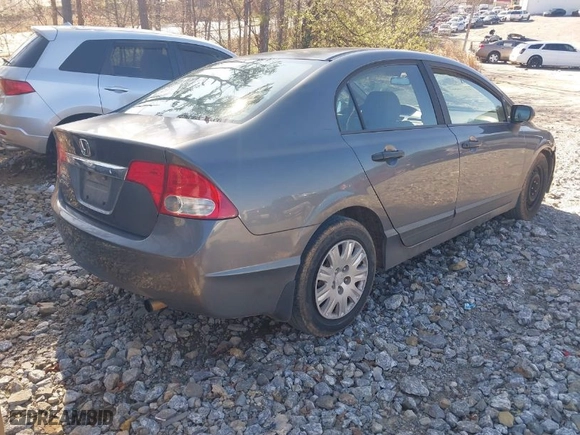 2010 Honda Civic Sdn DX-VP with VIN 19XFA1F33AE069806, listed as a IAAI auction lot 41770002 with 288,719 mi miles. Bid and sale history available at carsss.com. Image 4.
