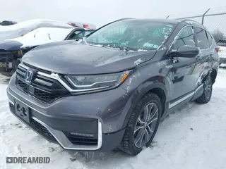 2020 Honda CR-V Hybrid Touring with VIN 7FART6H91LE001303, listed as a IAAI auction lot 41429438 with 61,560 mi miles. Bid and sale history available at carsss.com. Image 17.