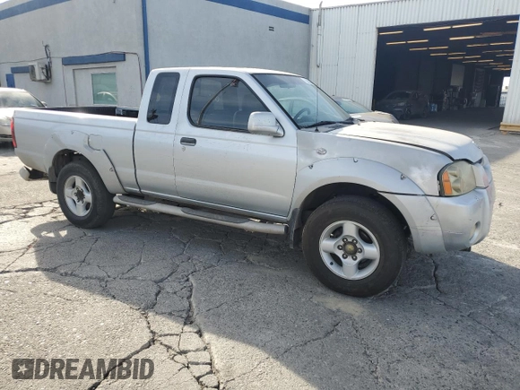 2001 Nissan Frontier SE Desert Runner with VIN 1N6ED26T11C345641, listed as a Copart auction lot 85855154 with 227,928 mi miles and Salvage title. Bid and sale history available at DreamBid. Image 4.