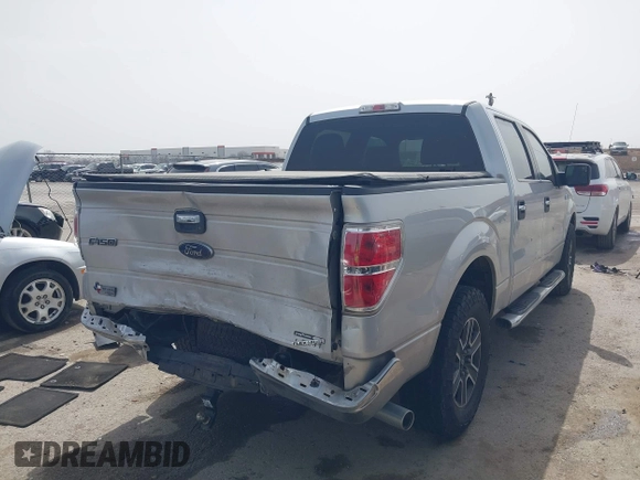 2013 Ford F-150 XL with VIN 1FTFW1CF6DKG22708, listed as a IAAI auction lot 41725908 with 155,530 mi miles and . Bid and sale history available at carsss.com. Image 4.