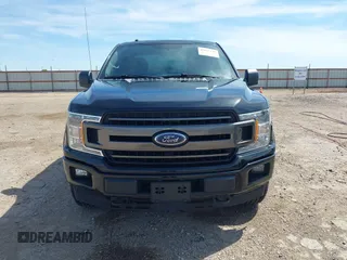 2018 Ford F-150 XL with VIN 1FTEX1EP7JFC21008, listed as a IAAI auction lot 42072145 with 102,679 mi miles and . Bid and sale history available at DreamBid. Image 12.