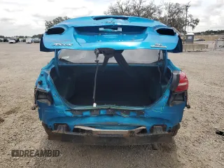 2016 Ford Focus SE z VIN 1FADP3F21GL386580, wystawiony jako Copart lot #63326425 z przebiegiem 82 139 mil mil oraz Szkoda całkowita • Salvage title. Historia ofert i sprzedaży dostępna na DreamBid. Obrazek 6.