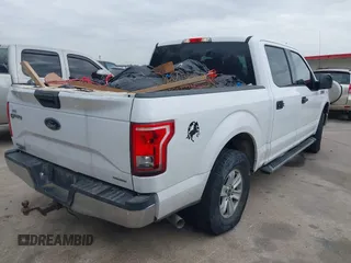 2015 Ford F-150 XL with VIN 1FTEW1CF1FKF21879, listed as a IAAI auction lot 41432470 with 86,658 mi miles. Bid and sale history available at carsss.com. Image 4.