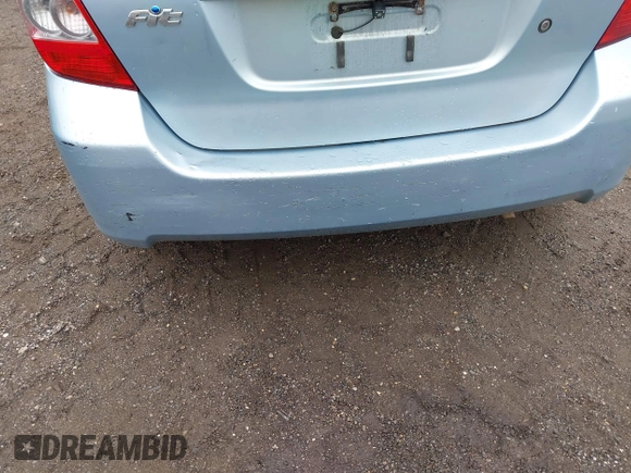 2007 Honda Fit z VIN JHMGD38417S035560, wystawiony jako IAAI lot #41960233 z przebiegiem 130 161 mil mil oraz . Historia ofert i sprzedaży dostępna na DreamBid. Obrazek 12.