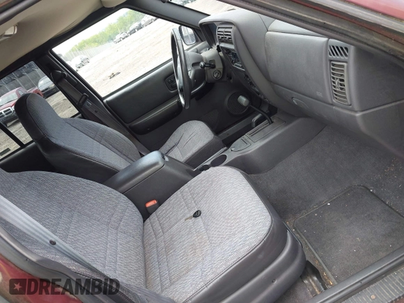 2000 Jeep Cherokee with VIN 1J4FF48SXYL148361, listed as a IAAI auction lot 42786017 with 159,908 mi miles and . Bid and sale history available at DreamBid. Image 5.