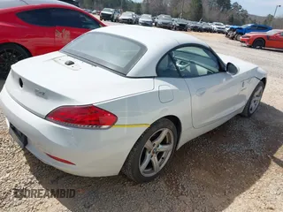 2011 BMW Z4 sDrive30i with VIN WBALM5C55BE380154, listed as a IAAI auction lot 41815724 with 118,062 mi miles. Bid and sale history available at carsss.com. Image 4.