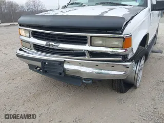 1997 Chevrolet Tahoe with VIN 1GNEK13R4VJ361515, listed as a IAAI auction lot 41768386 with 216,974 mi miles. Bid and sale history available at carsss.com. Image 6.