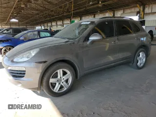 2012 Porsche Cayenne S Hybrid with VIN WP1AE2A25CLA93763, listed as a Copart auction lot 64018384 with 117,226 mi miles and Clean title. Bid and sale history available at DreamBid. Image 1.