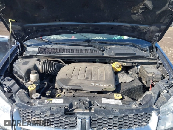 2013 Dodge Grand Caravan Crew with VIN 2C4RDGDG8DR795483, listed as a IAAI auction lot 41781570 with 188,098 mi miles and . Bid and sale history available at DreamBid. Image 10.
