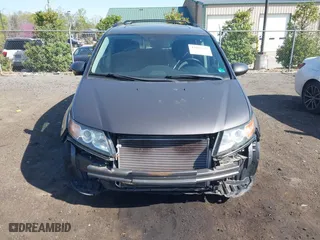 2016 Honda Odyssey EX-L with VIN 5FNRL5H65GB024360, listed as a IAAI auction lot 42005732 with 82,667 mi miles. Bid and sale history available at carsss.com. Image 12.
