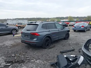 2022 Volkswagen Tiguan SE R-Line Black z VIN 3VVCB7AX9NM014741, wystawiony jako IAAI lot #42043123 z przebiegiem 71 777 mil mil oraz . Historia ofert i sprzedaży dostępna na DreamBid. Obrazek 4.