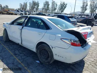 2015 Toyota Camry XLE with VIN 4T1BF1FK6FU106259, listed as a IAAI auction lot 41708580 with 86,673 mi miles. Bid and sale history available at carsss.com. Image 3.
