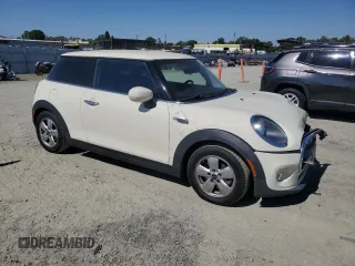 2020 MINI Hardtop Cooper with VIN WMWXR3C02L2M26554, listed as a Copart auction lot 64797225 with 35,180 mi miles and Salvage title. Bid and sale history available at DreamBid. Image 4.