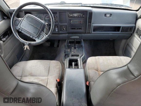 1995 Jeep Cherokee Sport z VIN 1J4FJ68S8SL650142, wystawiony jako Copart lot #51923775 z przebiegiem 329 796 mil mil oraz Czysty tytuł • Clean title. Historia ofert i sprzedaży dostępna na DreamBid. Obrazek 8.