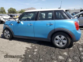 2015 MINI Hardtop 4 Door z VIN WMWXS5C5XFT827473, wystawiony jako Copart lot #58261135 z przebiegiem 75 439 mil mil oraz Szkoda całkowita • Salvage title. Historia ofert i sprzedaży dostępna na DreamBid. Obrazek 2.