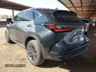 2022 Lexus NX with VIN JTJAGCEZ1N5004266, listed as a IAAI auction lot 41701672 with 14,997 mi miles. Bid and sale history available at carsss.com. Image 3.