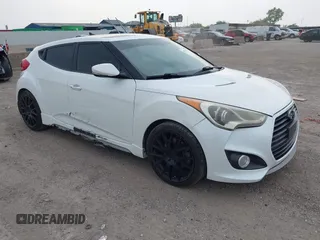 2013 Hyundai Veloster Turbo with VIN KMHTC6AE5DU104074, listed as a IAAI auction lot 42225574 with 172,836 mi miles and . Bid and sale history available at DreamBid. Image 1.
