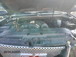 2014 GMC Yukon Denali z VIN 1GKS1EEF4ER230535, wystawiony jako Copart lot #76079844 z przebiegiem 153 180 mil mil oraz Szkoda całkowita • Salvage title. Historia ofert i sprzedaży dostępna na DreamBid. Obrazek 13.