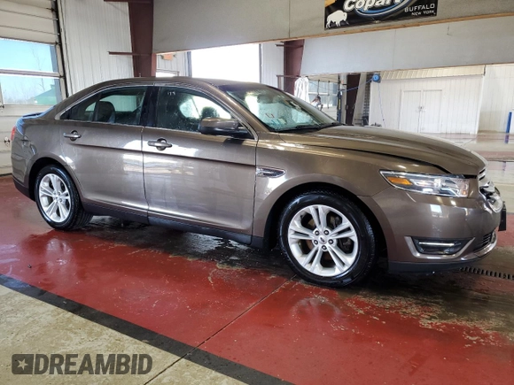 2015 Ford Taurus SEL with VIN 1FAHP2E94FG157022, listed as a Copart auction lot 74569614 with 133,223 mi miles and Salvage Title. Bid and sale history available at DreamBid. Image 4.
