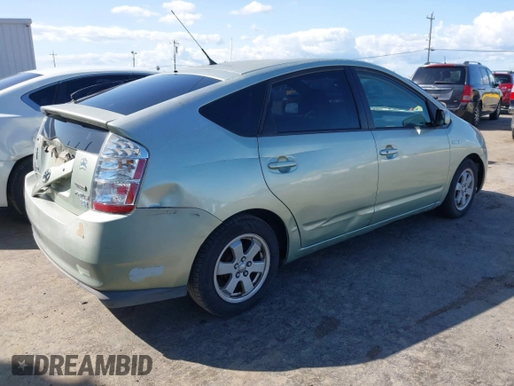 2007 Toyota Prius z VIN JTDKB20U877556527, wystawiony jako IAAI lot #41965245 z przebiegiem 259 572 mil mil oraz . Historia ofert i sprzedaży dostępna na DreamBid. Obrazek 4.