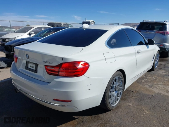 2015 BMW 4 Series 428i with VIN WBA3N3C51FK232902, listed as a IAAI auction lot 41547137 with 136,306 mi miles and . Bid and sale history available at DreamBid. Image 4.