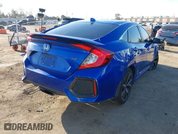 2018 Honda Civic Si with VIN 2HGFC1E56JH700325, listed as a IAAI auction lot 42007770 with 101,386 mi miles and . Bid and sale history available at DreamBid. Image 4.