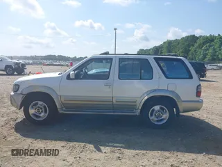1998 Infiniti QX4 z VIN JNRAR05Y9WW020956, wystawiony jako IAAI lot #42169231 z przebiegiem 99 999 mil mil oraz . Historia ofert i sprzedaży dostępna na DreamBid. Obrazek 14.