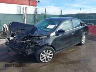 2014 Volkswagen Jetta Sedan SE w/Connectivity/Sunroof PZEV with VIN 3VWD17AJ5EM422359, listed as a IAAI auction lot 38090147 with 51,234 mi miles. Bid and sale history available at carsss.com. Image 2.